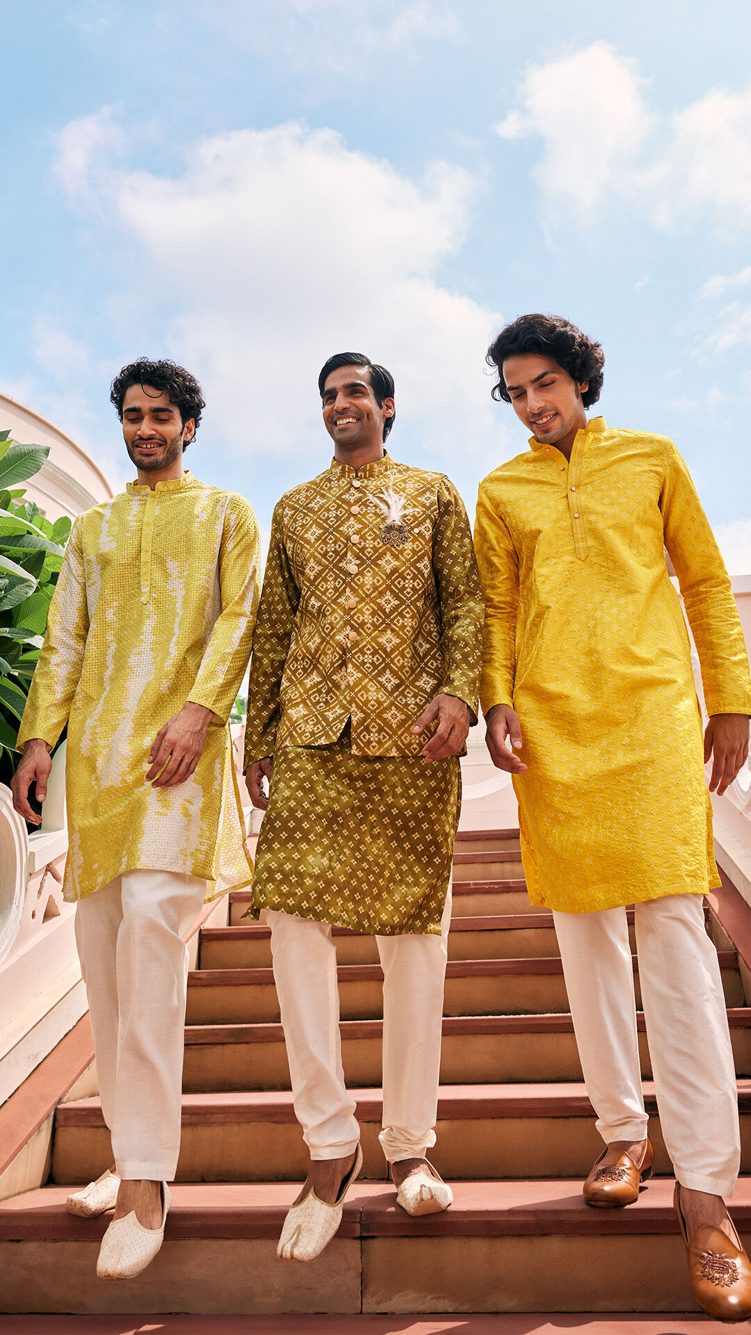 men in yellow kurta and green kurta jacket set